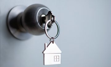 House for rent key in silver door knob